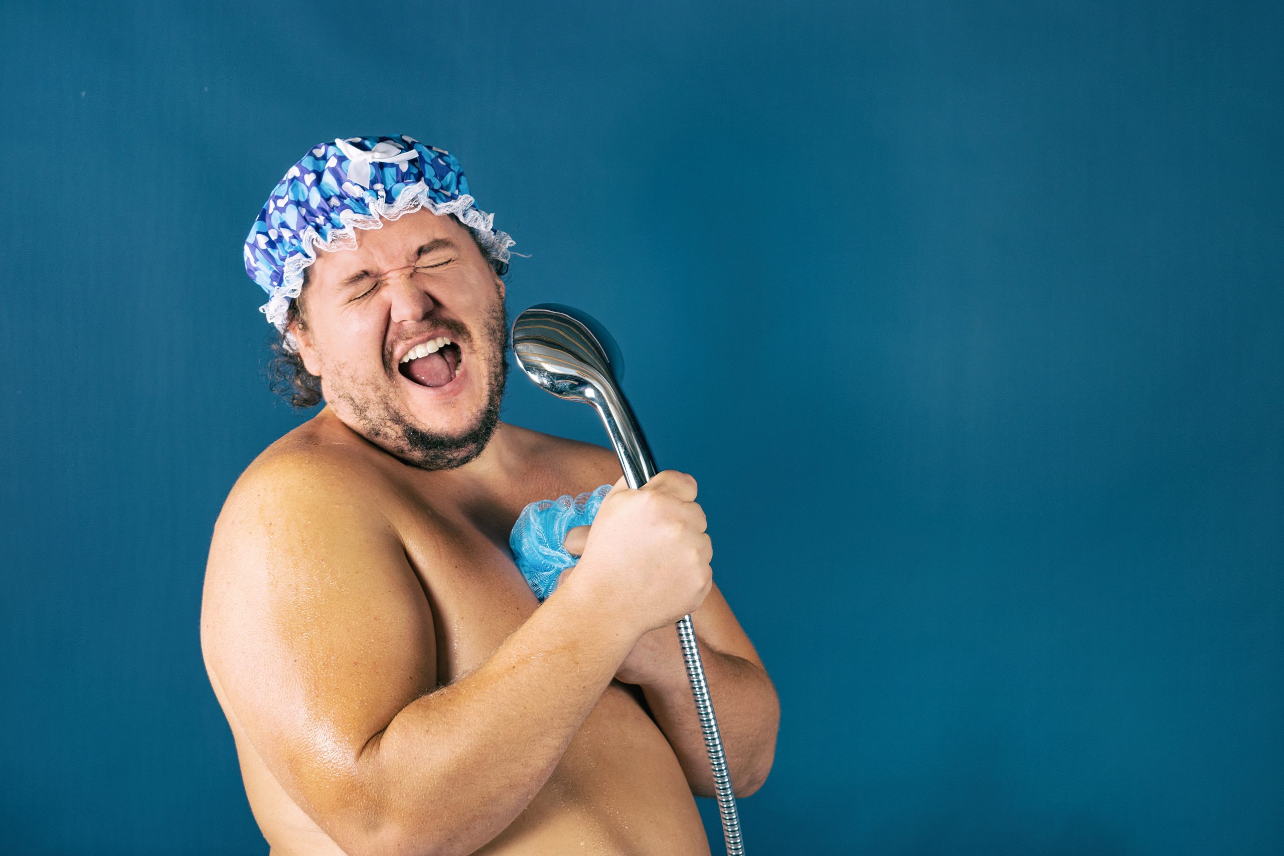 Funny,Fat,Man,In,Blue,Cap,Sing,In,The,Shower.