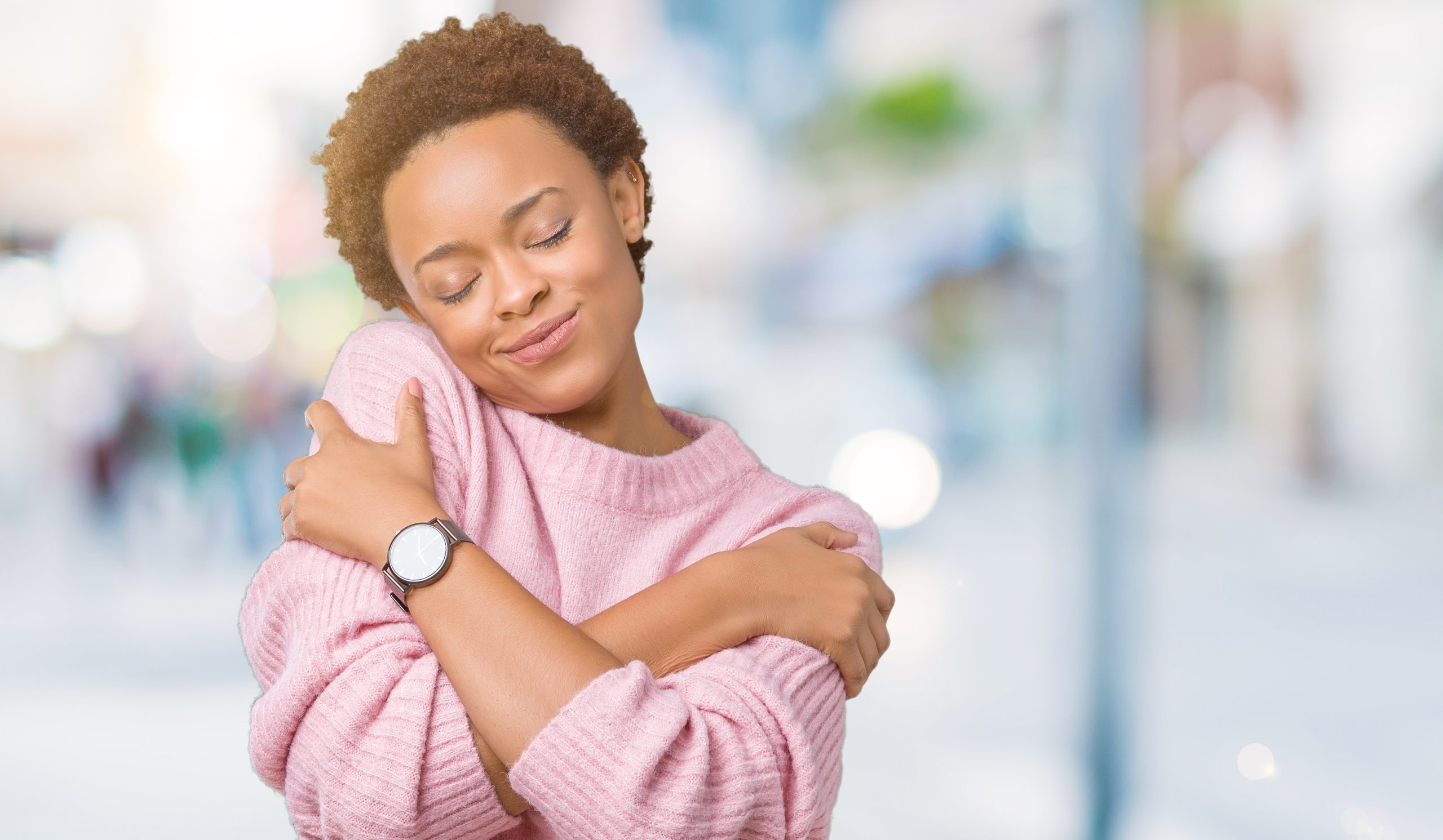 Beautiful,Young,African,American,Woman,Over,Isolated,Background,Hugging,Oneself