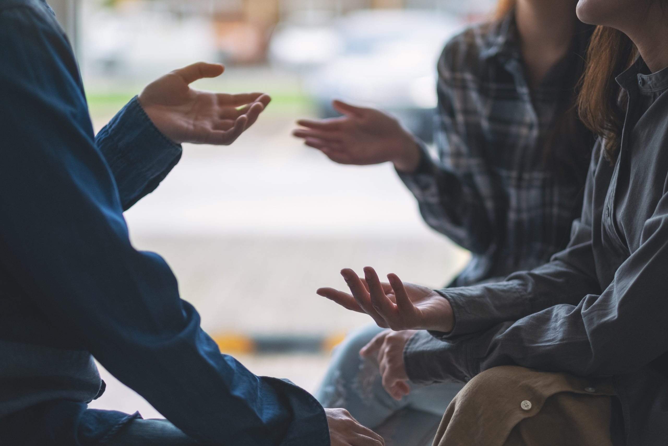 People,Sitting,And,Talking,Together