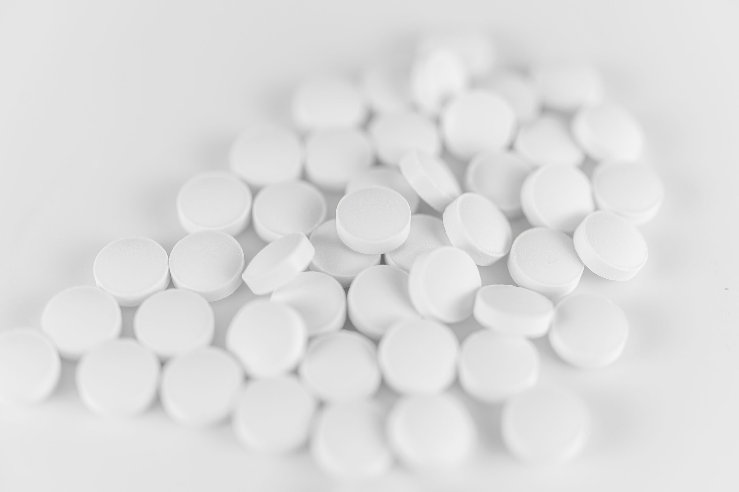 Pile,Of,Medication,With,White,Background.