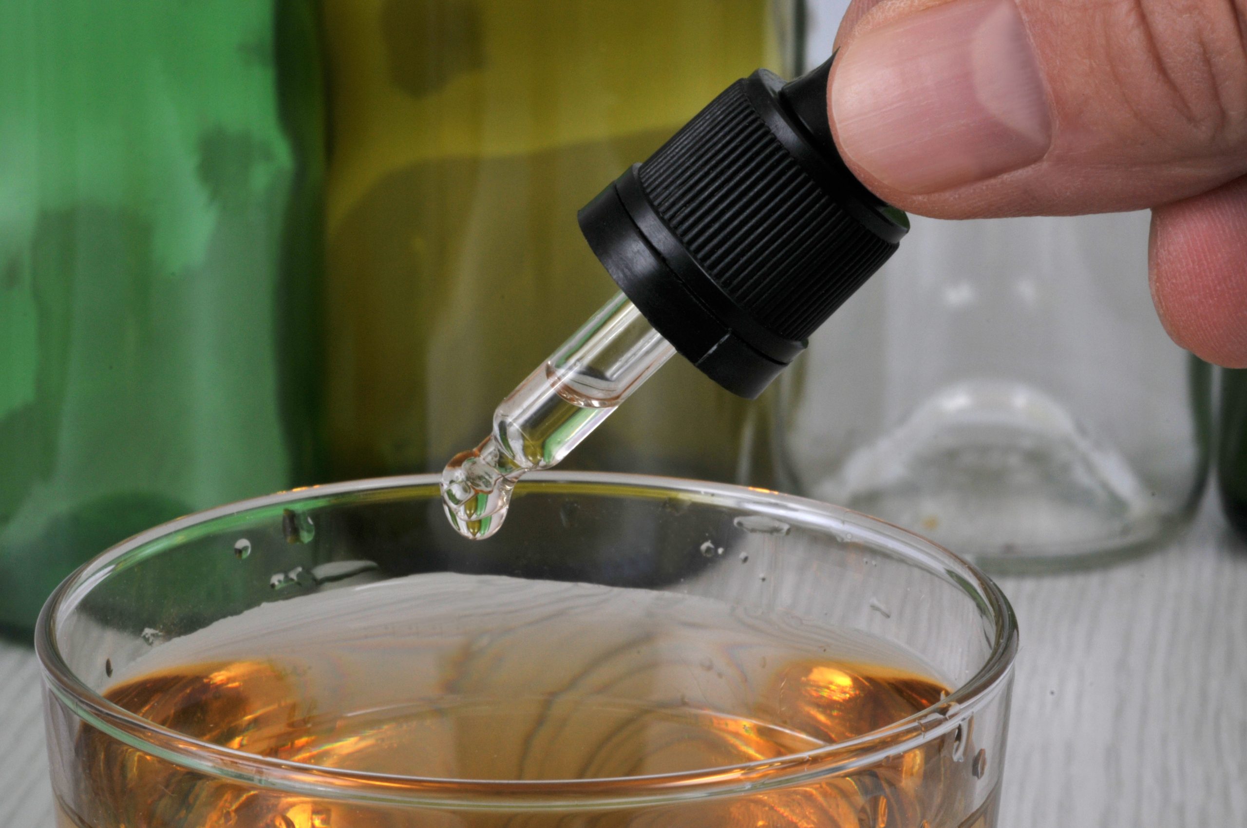 Concept,Of,Pouring,Ghb,Into,A,Glass,With,A,Pipette
