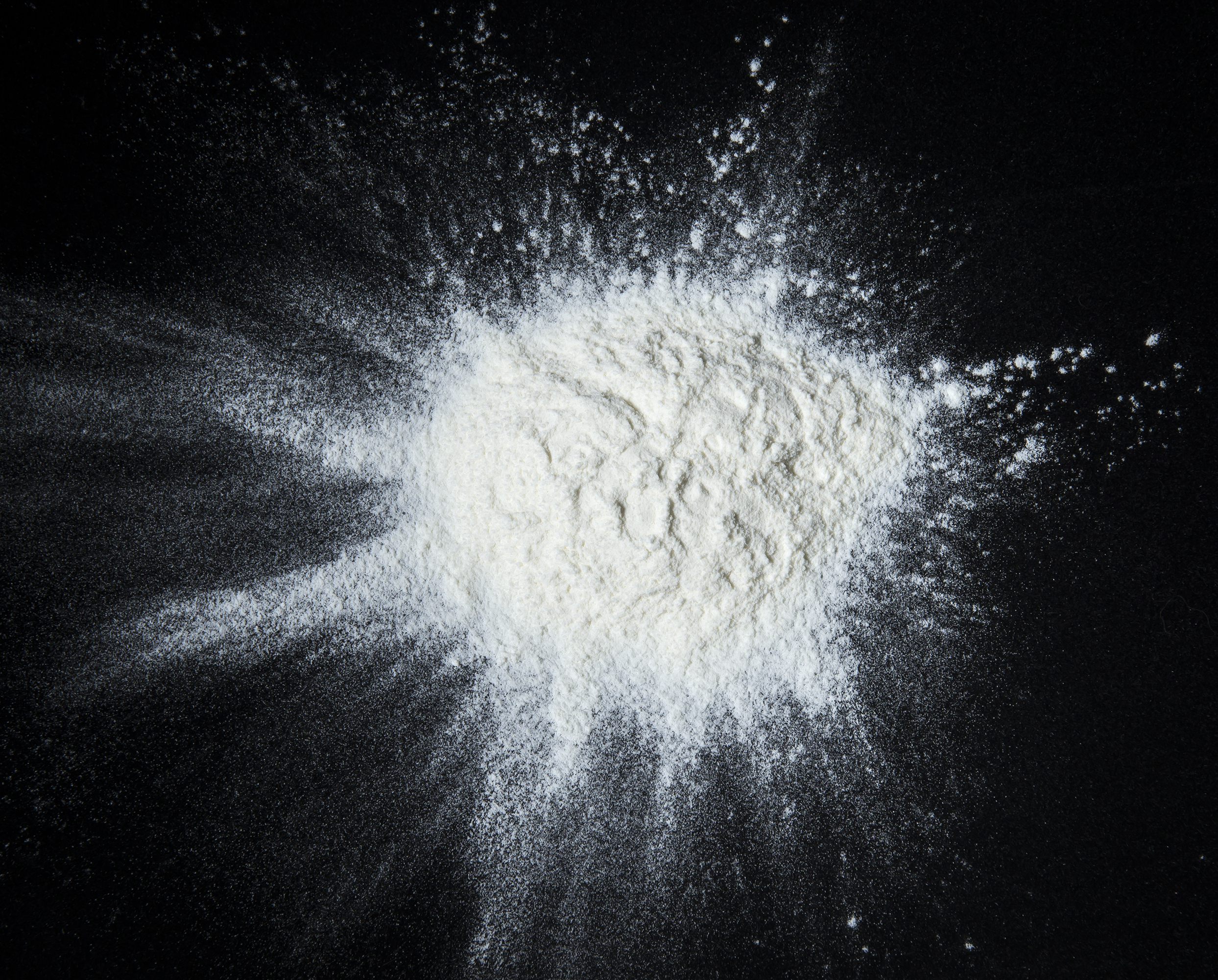 White,Powder,On,A,Black,Background